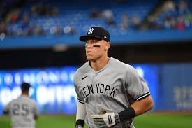 Aaron Judge: How many homeruns is on pace for| Holding a water bottle