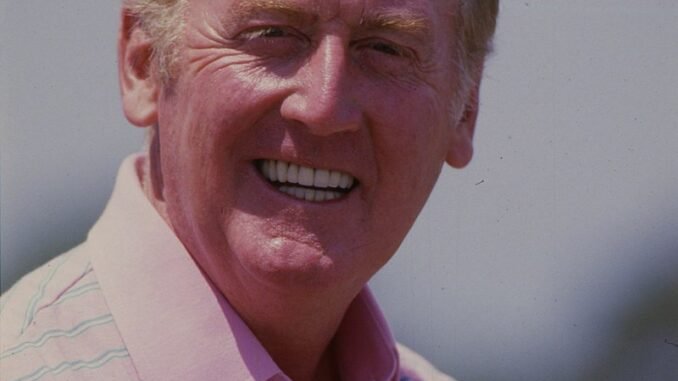 Vin_Scully,_Dodgers_announcer,_at_Dodgertown_in_Vero_Beach,_Florida_for_Spring_Training,_1985_(cropped)_(cropped)