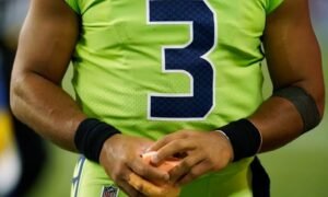 Russell Wilson: What team did go to| Hand| Hand surgery