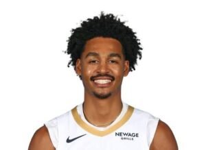 Jordan Poole: Stats | Trade | Height | Warriors | Jersey | Contract
Jordan Poole has become one of the most talked-about NBA guards of the past decade. From his humble beginnings in Milwaukee to NBA championship glory with the Golden State Warriors, followed by high-profile trades and a major contract, Poole’s journey offers a fascinating narrative rich in stats, performance trends, and business decisions that have impacted multiple NBA franchises. In this detailed article, we’ll explore his career progression, numbers, notable trades, physical profile, jersey significance, contract details, and more.
1. Early Life & College Career
Born on June 19, 1999, in Milwaukee, Wisconsin, Jordan Anthony Poole developed into a promising basketball talent at Rufus King High School before transferring to La Lumiere School in Indiana, where he showcased his scoring ability and court leadership. His exploits in high school helped him secure a place at the University of Michigan, where he played two seasons (2017–19) with the Wolverines. At Michigan, Poole was known for his scoring instincts, creativity with the ball, and clutch shot-making — including a memorable game-winning three that propelled Michigan deep into the NCAA Tournament.
Wikipedia
2. NBA Draft & Early Years with the Warriors
In the 2019 NBA Draft, the Golden State Warriors selected Poole with the 28th overall pick in the first round — a decision that would shape both his early career and the Warriors’ future rotation. After signing his rookie contract, Poole split early time between the NBA and the G-League affiliate Santa Cruz Warriors, where he refined his shooting and confidence on the court.
Wikipedia
3. Height, Build & Playing Style
Poole stands 6′4″ (1.93 m) tall and weighs approximately 194 lbs (88 kg). His height and athletic profile allow him to play both shooting guard and combo guard roles effectively. On offense, Poole blends long-range shooting, quick drives to the rim, and improved playmaking — traits that have helped him evolve from an unpolished rookie into a reliable scoring threat.
Wikipedia
+1
4. Breakout with the Warriors & Championship Success
Poole’s true breakout with the Warriors came in the 2021-22 NBA season, where his scoring, efficiency, and ball-handling took a leap. He became a key part of Golden State’s rotation, often creating his own shot and spacing the floor alongside stars like Stephen Curry and Klay Thompson. His role expanded, and Poole emerged as a reliable offensive weapon.
That season culminated in the Warriors capturing the 2022 NBA Championship, with Poole contributing significantly during the regular season and playoff stretch.
Wikipedia
His speed, shooting prowess, and confidence on the perimeter made him a fan favorite — earning him the unofficial nickname “Poole Party.”
Wikipedia
5. Career Stats & On-Court Impact
Across his NBA career, Poole has shown consistent scoring ability, facilitating, and the capacity for big offensive performances. For the 2025-26 season with the New Orleans Pelicans, he’s averaging approximately:
17.3 points per game
3.4 assists per game
1.7 rebounds per game
35.4% FG and 33.9% 3P%
(Stats vary by source and through the season).
Wikipedia
+1
In previous campaigns, especially with the Washington Wizards, Poole posted career-high scoring and playmaking numbers, showcasing his ability to lead an offense.
The Washington Post
6. Trades & Team Changes
Poole’s NBA journey includes several significant organizational moves:
🔹 Warriors to Wizards (2023):
After four seasons with Golden State, Poole was traded to the Washington Wizards as part of the deal that brought veteran guard Chris Paul to the Warriors.
Wikipedia
🔹 Wizards to Pelicans (2025):
In the summer of 2025, Poole was traded to the New Orleans Pelicans in a multi-player deal that also involved Saddiq Bey going to the Pelicans and CJ McCollum and Kelly Olynyk heading to Washington.
NBA
+1
This trade represented a shift for the Pelicans, aiming to inject youth and scoring punch into their backcourt — though some reports suggested potential challenges with his fit and contract size later in the season.
Wiz of Awes
7. Jersey Numbers & Branding
Throughout his career, Poole has worn the #3 jersey, a number that has become synonymous with his scoring persona and branding in the league — a bold choice for a player with a dynamic offensive game. His jersey sales and fan recognition spiked particularly during his time with the Warriors and early Wizards years, reflecting his popularity and impact on both sides of the court.
8. Contract Details & Financial Landscape
Poole signed a significant four-year NBA extension in 2022 with the Warriors worth up to $140 million, including incentives — a deal that indicated the franchise’s belief in his long-term upside.
spotrac.com
+1
According to contract and salary tracking, his current annual salary around the 2025-26 season is in the range of $31.8 million, with his contract running through the 2026-27 season and a free-agency window thereafter.
SalarySwish
Perhaps due to his contract size and inconsistent efficiency at times, Poole’s contract has been a talking point in NBA circles — including debates about his trade value and long-term planning for teams like the Pelicans.
Wiz of Awes
9. Strengths & Weaknesses
Strengths:
Versatile scoring ability from beyond the arc and inside the paint
Ball-handling and shot creation
Playmaking and clutch potential
Experience as a championship winner and primary option on offense
Areas for Improvement:
Defensive consistency
Efficiency fluctuations
Shot selection under pressure
Overall, Poole’s skill set makes him a high-value offensive guard capable of leading a team’s second unit or being a starting backcourt contributor.
Frequently Asked Questions (FAQs)
1. What is Jordan Poole’s height and position?
Jordan Poole is 6′4″ (1.93 m) tall and primarily plays as a shooting guard, though he can also handle point guard duties.
NBA
2. What teams has Poole played for in the NBA?
Poole began with the Golden State Warriors (2019–2023), was traded to the Washington Wizards (2023–2025), and then to the New Orleans Pelicans in 2025.
Wikipedia
3. What are some of Poole’s career highlights?
His major highlight includes winning the 2022 NBA Championship with the Warriors and delivering multiple high-scoring games throughout his career.
Wikipedia
4. How much is Jordan Poole’s NBA contract worth?
Poole signed a four-year deal reportedly worth up to $140 million in 2022, with current salary figures around $31.8 million for the 2025-26 season.
spotrac.com
+1
5. Why was Poole traded from the Warriors?
The Warriors traded Poole as part of a strategic move in 2023 to acquire Chris Paul and reshape their roster.
Wikipedia
6. What jersey number does Jordan Poole wear?
He wears #3, which has become a core part of his NBA identity.
7. What are Poole’s latest season stats?
In the 2025-26 season (as of mid-season data), Poole is averaging around 17.3 points, 3.4 assists, and 1.7 rebounds per game.
Wikipedia
Conclusion
Jordan Poole’s journey from a late first-round draft pick to an NBA champion, high-profile starter, and well-paid core rotation player illustrates both the promise and unpredictability of NBA careers. His combination of scoring flair, playmaking, and locker-room presence makes him a compelling figure in league discussions, even as trades and contract considerations shape his ongoing story.
Whether he continues to rise or reshapes his role in a new team context, Poole remains a player worth watching for fans, analysts, and NBA strategists alike.