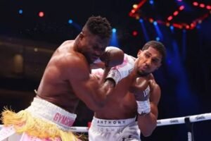 Introduction
On March 8, 2024, one of the most electrifying heavyweight boxing matchups in recent memory took place when Anthony Joshua faced Francis Ngannou in Knockout Chaos at the Kingdom Arena in Riyadh, Saudi Arabia. While many doubted how the former two-time unified heavyweight champion would fare against a former UFC heavyweight king, Joshua reaffirmed his elite status with a seismic knockout victory. This article provides the most comprehensive breakdown of the fight—highlighting each round, knockout details, key moments, reaction, and implications for both fighters.
Fight Setup: Anthony Joshua vs Francis Ngannou
Anthony Joshua (28-3, 25 KOs) headed into the fight searching for a defining moment in his career. After rebounding from setbacks, including losses to Oleksandr Usyk, Joshua looked revitalized following his fifth-round knockout of Otto Wallin in December 2023. His clash with Francis Ngannou promised size, power, and drama.
Wikipedia
Francis Ngannou (0-1 in boxing) had only one professional boxing bout under his belt—an explosive split decision loss to Tyson Fury in October 2023. Despite the loss, Ngannou’s performance stunned fans, as he dropped the world heavyweight champion and showed he belonged in the ring’s elite sphere.
Wikipedia
The anticipation was palpable: could Ngannou make history by dethroning a boxing legend, or would Joshua’s refined skillset and power prevail? Let’s break down how that showdown unfolded.
Knockout Highlights
Round-by-Round Breakdown
📍 Round 1: Early Domination
From the opening bell, Joshua took command of the ring. With crisp footwork and precise jabs, he dictated the pace against Ngannou, who showed athleticism but lacked the refined boxing technique of his opponent. Midway through the round, Joshua landed a clean straight right hand that sent Ngannou to the canvas for the first time. Though Ngannou beat the count, he visibly struggled to regain stability.
ESPN
📍 Round 2: Crushing Power
Ngannou showed heart by surviving the first knockdown and tightening his defence. But Joshua’s timing and power were too much. He landed another massive shot early in the second, flooring Ngannou a second time. Ngannou rose again, demonstrating resilience, but was unable to get his footing back. Moments later, Joshua unleashed a thunderous right hand that connected flush—sending Ngannou flat on his back, out cold. The referee called a halt shortly after, marking perhaps the most brutal finish of Joshua’s career.
ESPN
+1
The Knockout Sequence
What made this knockout so stunning wasn’t just the force, but how it unfolded:
Punch Placement: Joshua’s straight rights were set up perfectly off his jab, keeping Ngannou off-balance.
Timing: Joshua exploited openings created as Ngannou tried to counter.
Execution: The final blow landed clean, with Ngannou unable to defend.
This moment will be replayed in highlight reels for years to come, capturing Joshua’s boxing IQ and elite punching power against an opponent known for raw athleticism rather than technical boxing prowess.
Technical Breakdown: Why Joshua Won Big
Superior Boxing Fundamentals
Unlike Ngannou, whose combat experience stems primarily from MMA striking, Joshua’s background is rooted in the Sweet Science. His:
Footwork
Ring generalship
Combination setups
…kept him in control despite Ngannou’s size and power. Joshua’s ability to consistently maintain distance and land accurate punch combinations was central to his success.
Conditioning and Stamina
Though short in duration due to the knockout, Joshua looked comfortable through both rounds. His conditioning allowed him to maintain crisp punch output without fatigue, crucial in capitalizing on openings when they came.
Ngannou’s Performance: More Than Just Power
Francis Ngannou entered as the underdog but wasn’t overmatched. Against Tyson Fury in his boxing debut, he proved he could hang with top talent. Ngannou’s size, reach, and aggression posed threats at times, and he showed he was willing to trade punch-for-punch when necessary.
Wikipedia
However, boxing isn’t just about raw power. Ngannou’s relative lack of pro boxing experience showed in:
Defensive positioning
Punch selection
Ring awareness
Though he ultimately lost decisively, he won respect from fans for stepping into the ring with a known boxing elite and being willing to engage.
What This Victory Means for Anthony Joshua
Bang Back Into Title Contention
Joshua’s resounding victory placed him firmly back in heavyweight contention. Following a rocky period of career setbacks, this knockout reaffirmed his status as a major force. It revived discussions of potential future fights with top heavyweights—especially contenders like Oleksandr Usyk or Tyson Fury.
The Independent
Marketability and Legacy
Joshua’s ability to finish fights in highlight-reel fashion boosts his commercial appeal. His knockout of Ngannou showed he’s not just a name—he’s still a devastating puncher capable of ending fights early. That kind of performance generates excitement among boxing fans and casual viewers alike.
Mental Rebound
Following his loss to Usyk and criticism from some corners, this victory served as a confidence booster—both personally and professionally for Joshua.
How Fans and Analysts Reacted
Positive Reaction Across the Boxing World
Many pundits labelled Joshua’s KO as one of his most impressive performances. Veteran observers praised Joshua’s timing, precision, and power, which combined for a dominant second-round finish.
Sky Sports
Ngannou’s Resilience Still Acknowledged
Despite the outcome, fans and fighters alike acknowledged Ngannou’s courage for stepping into elite boxing territory. His previous fight with Fury, where he knocked the world champion down, had already earned him respect—a narrative that carried into this bout.
Wikipedia
Fight Statistics Snapshot
Stat Category Anthony Joshua Francis Ngannou
Fight Record (Pre-Fight) 28–3 (25 KOs) 0–1 (Boxing)
Knockdowns Scored 3 0
Fight Duration 2 Rounds 2 Rounds
Final Result KO Win KO Loss
This statistical snapshot underscores the dominance of Joshua’s performance—even against a high-profile opponent.
Future Implications
For Anthony Joshua
Joshua’s emphatic win positions him for:
Major world title fights
High-profile pay-per-view bouts
Further legacy cementing opportunities
Whether it’s a blockbuster showdown with Tyson Fury or a unification bout with another top contender, Joshua’s stock has risen.
CBS Sports
For Francis Ngannou
Ngannou’s future in boxing remains open. While his loss was decisive, he’s still widely viewed as a crossover star who brings attention and intrigue to heavyweight boxing. He may return to MMA or pursue other big boxing matchups to build experience.
FAQs (Frequently Asked Questions)
1. Who won Anthony Joshua vs Francis Ngannou?
Anthony Joshua won by knockout in the second round, delivering a crushing finish to Ngannou’s bid.
ESPN
2. How many knockdowns were in the fight?
Joshua dropped Ngannou three times before the referee stopped the fight.
Wikipedia
3. When and where did the fight take place?
The battle occurred on March 8, 2024, at the Kingdom Arena in Riyadh, Saudi Arabia.
The Independent
4. Was this Ngannou’s first boxing fight?
No—Ngannou’s first pro boxing match was against Tyson Fury, where he lost a split decision but scored a knockdown of Fury.
Wikipedia
5. What does this win mean for Joshua’s career?
The KO bolsters Joshua’s heavyweight resume, positioning him for potential title contention and high-profile bouts in the future.
The Independent
Conclusion
The Anthony Joshua vs Francis Ngannou showdown was more than just a crossover spectacle—it was a definitive statement from one of boxing’s great heavyweights. Joshua’s brutal knockout not only thrilled fans but also reinforced his status as a fearsome puncher and top contender in the division. While Ngannou’s journey into boxing may be just beginning, Joshua’s emphatic victory will be remembered as one of the most dominant knockout performances of his recent career.
Whether you’re a die-hard boxing fan or a casual observer, the highlights from this fight are sure to stand the test of time. For boxing lovers around the world, it was a reminder of the raw excitement that heavyweight combat sports can deliver.