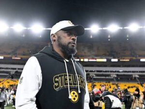 Mike Tomlin: Coach| Steelers| Titans| Is still coaching| Did retire